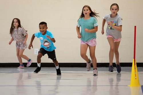 Kids playing in gym at Mt. Hope Community Center
