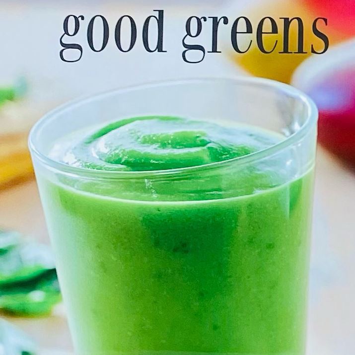 Green smoothie in a glass with the words "good greens"