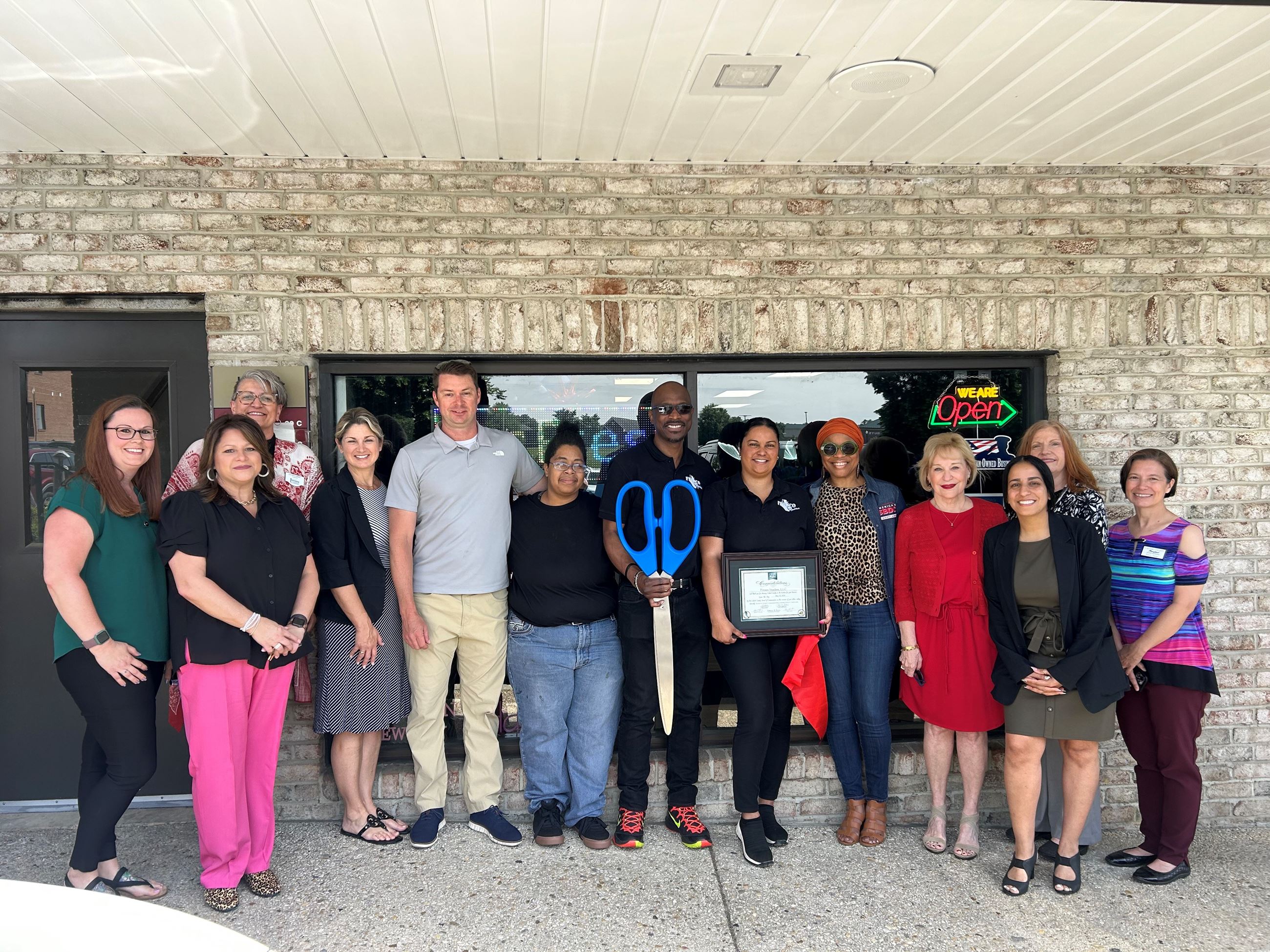 Group of people smiling at Fresco Studios